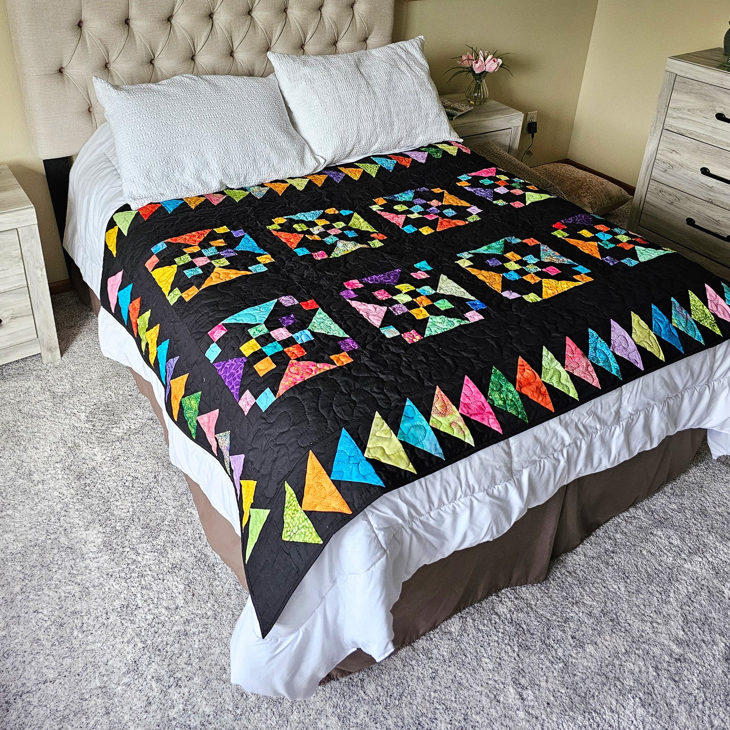 Vibrant Joy in black on bed