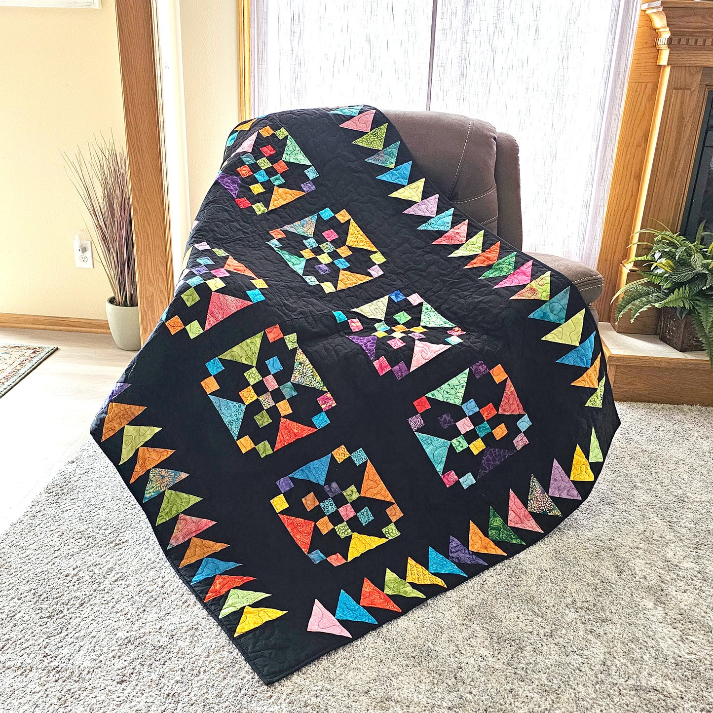 Vibrant Joy quilt on chair