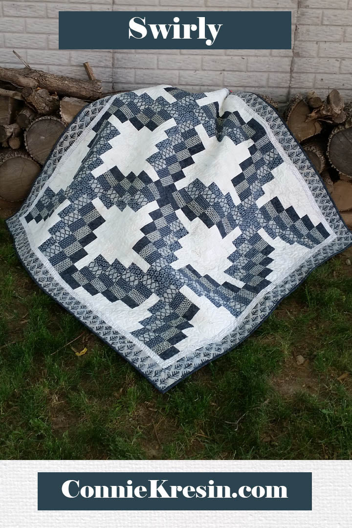 Swirly quilt pattern can be made in just one day! It uses 5 coordinating fabrics and a neutral.