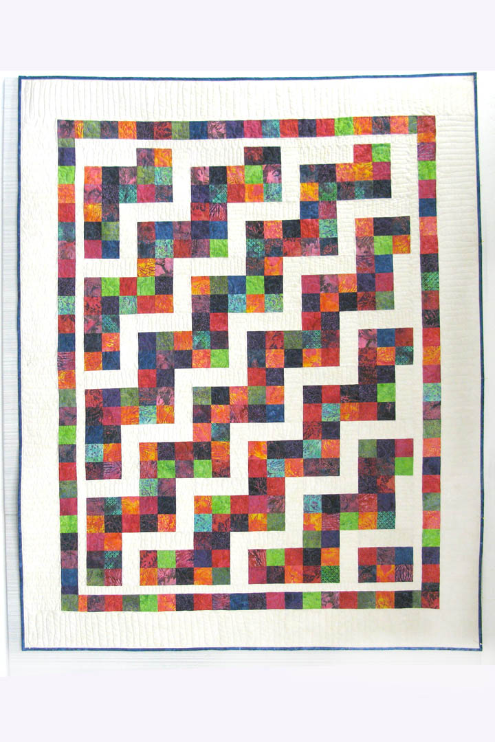 This is a fast and easy quilt pattern that you will have fun making. Confetti Steps uses one strip set, jelly roll or scraps from your stash to make a colorful quilt.