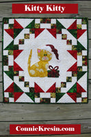 Kitty Kitty a cute applique quilt pattern, that has full size applique templates and full color diagrams to walk you through each step of the quilt. 
