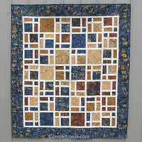 Scattered quilt pattern is fast and easy to make using bold and beautiful batiks or other fabrics for the blocks