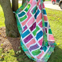 Sparkles quilt in bright colorful fabrics