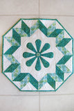 Spin the Wheel quilted wall hanging pattern with applique in the center easy to make