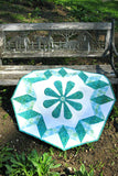 Spin the Wheel quilted wall hanging pattern with applique in the center easy to make