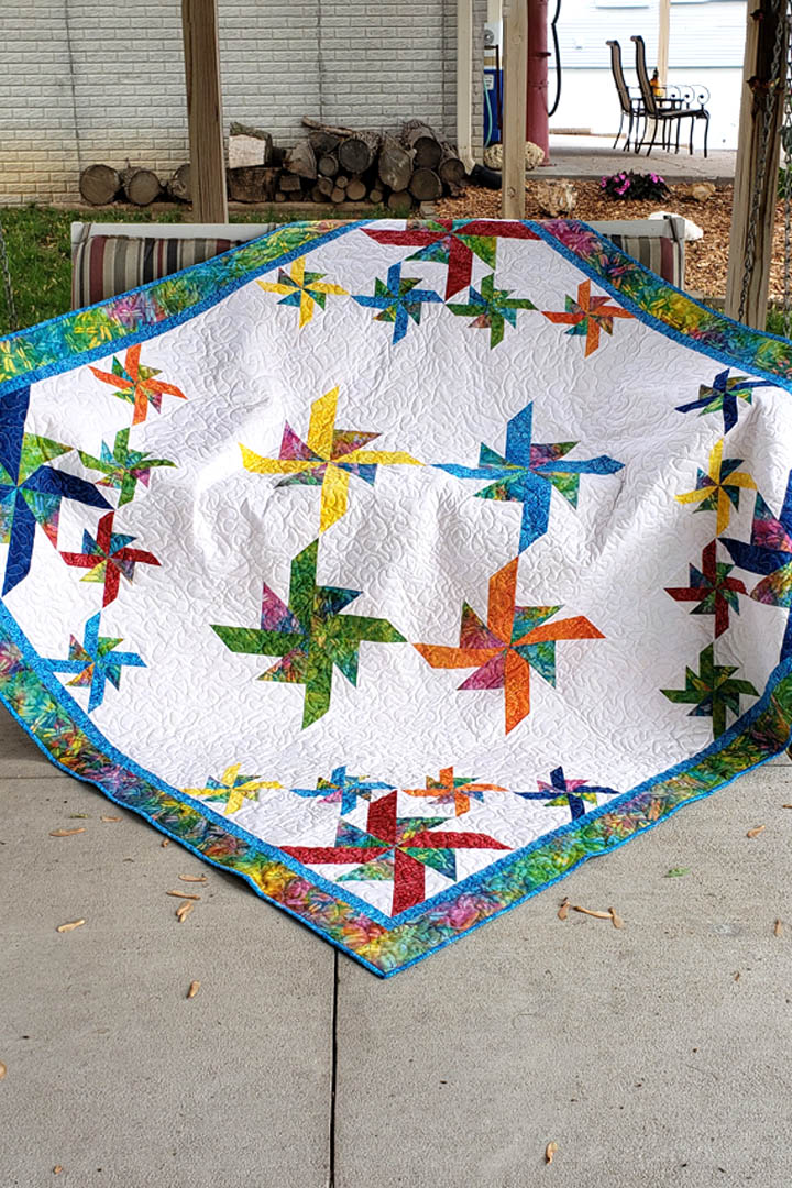 Crystals Swirls is a beautiful quilt made with just one simple block made in two different sizes.