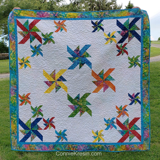 Crystals Swirls is a beautiful quilt made with just one simple block made in two different sizes.